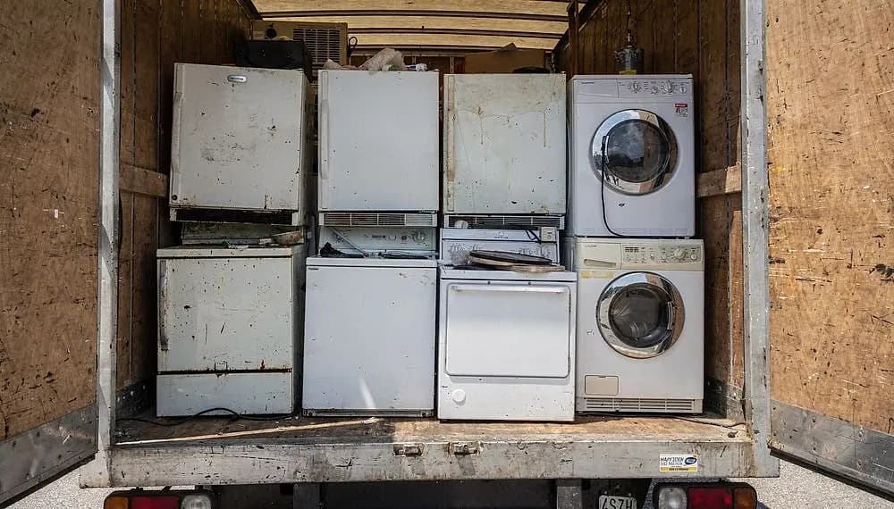 Appliance removal and disposal crew at work in the Chicago area