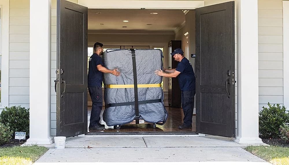 Grandfather clock and organ moving crew at work in the Chicago area