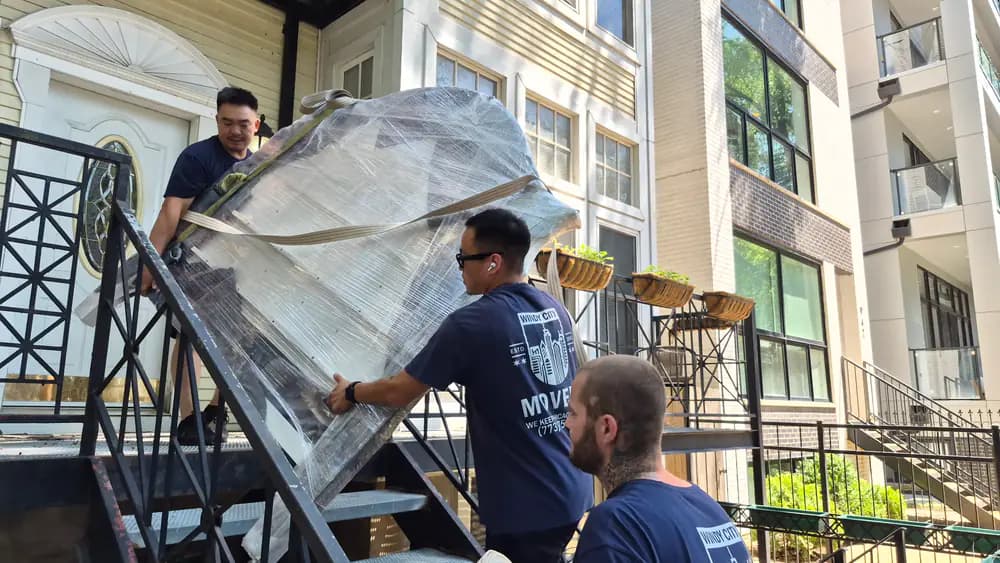 Windy City Movers team loading a moving truck in Lincoln Square, Illinois