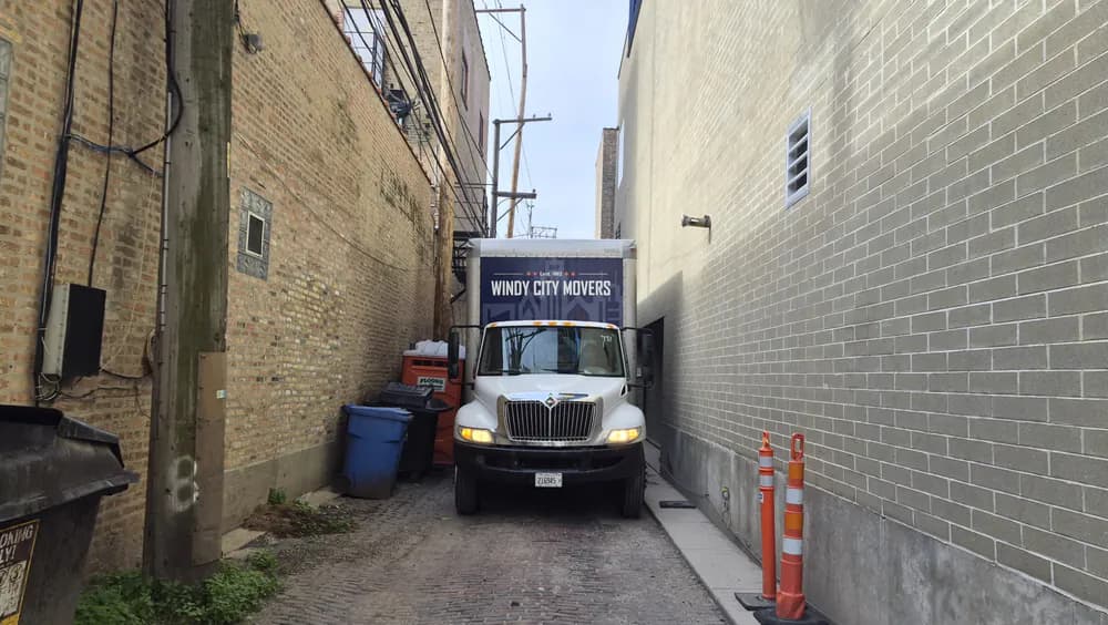 Windy City Movers team loading a moving truck in Logan Square, Illinois